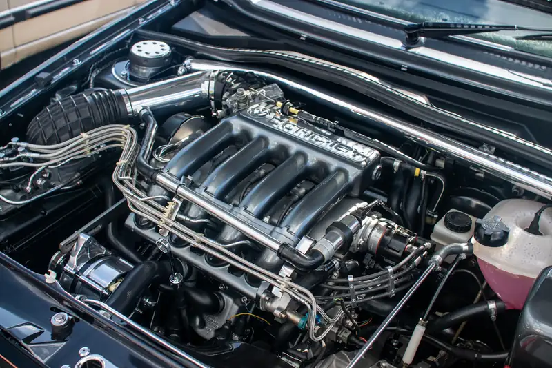 Clean four-cylinder engine bay of a compact car